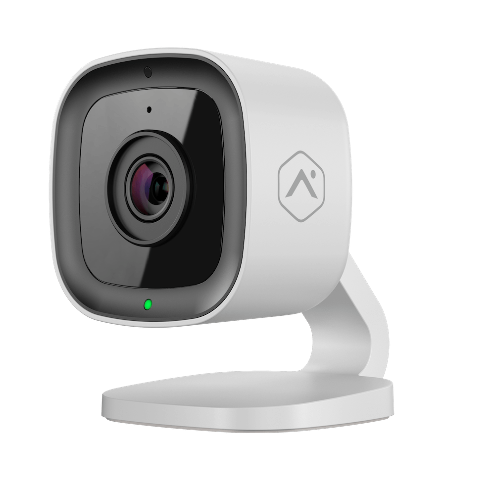 This image shows a modern security camera with a white casing. It has a black lens, adjustable stand, and a visible brand logo on the front.