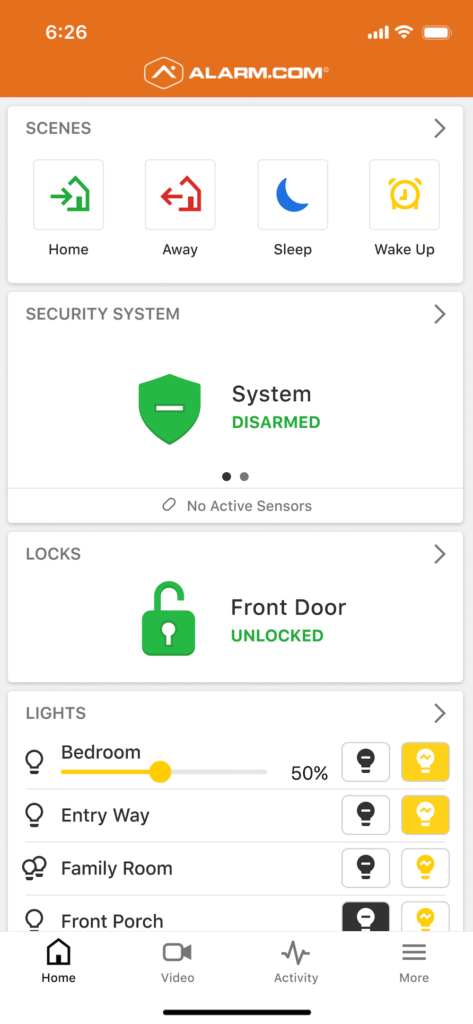 This smartphone screenshot shows the Alarm.com app interface with options for home automation, indicating scenes, security system status, lock status, and light controls.