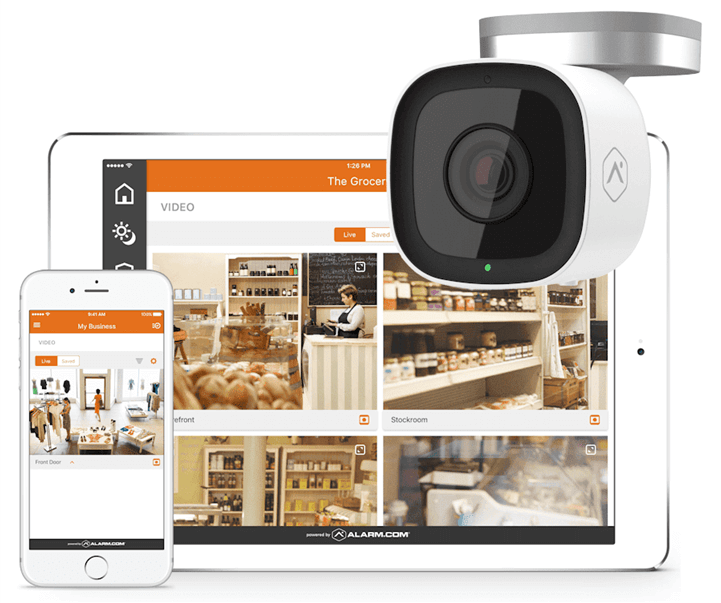A security camera is displayed in front of two devices showing surveillance footage from various angles within a retail store setting, monitored through an app.