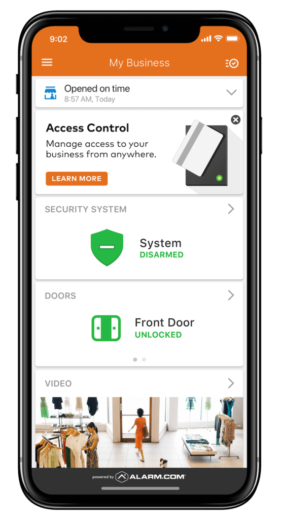 This image shows a smartphone displaying a security system app interface indicating "System Disarmed" and "Front Door Unlocked", with a person in a store on video.